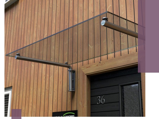 Стеклянные козырьки на входы и фасады в Новотроицке